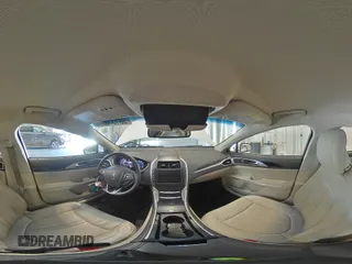 2016 Lincoln MKZ z VIN 3LN6L2GK6GR624511, wystawiony jako Copart lot #56137625 z przebiegiem 88 289 mil mil oraz Szkoda całkowita • Salvage title. Historia ofert i sprzedaży dostępna na DreamBid. Obrazek 14.