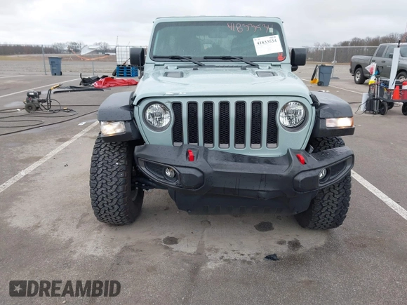 2023 Jeep Wrangler Rubicon with VIN 1C4JJXFG7PW654564, listed as a IAAI auction lot 41833534 with 22,277 mi miles and . Bid and sale history available at DreamBid. Image 6.