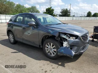 2016 Mazda CX-5 Sport z VIN JM3KE2BY4G0632946, wystawiony jako Copart lot #61447435 z przebiegiem 178 492 mil mil oraz Szkoda całkowita • Salvage title. Historia ofert i sprzedaży dostępna na DreamBid. Obrazek 4.