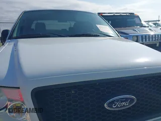 2004 Ford F-150 XLT z VIN 1FTPX04514KB70491, wystawiony jako IAAI lot #41320139 z przebiegiem 131 891 mil mil oraz . Historia ofert i sprzedaży dostępna na DreamBid. Obrazek 19.