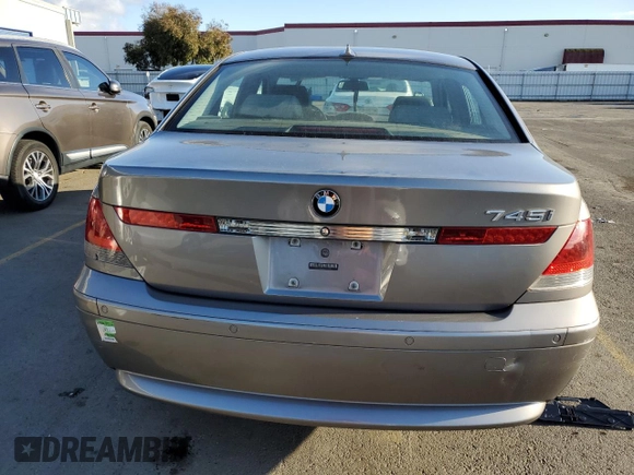 2002 BMW 7 Series 745i with VIN WBAGL63462DP57016, listed as a Copart auction lot 81025594 with 121,870 mi miles and Salvage Title. Bid and sale history available at DreamBid. Image 6.