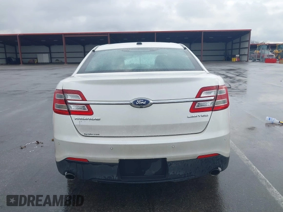 2014 Ford Taurus Limited with VIN 1FAHP2F80EG183153, listed as a IAAI auction lot 40860378 with 163,294 mi miles. Bid and sale history available at carsss.com. Image 17.