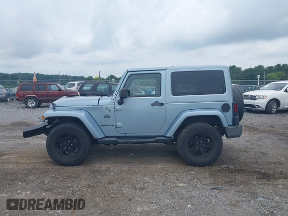 2012 Jeep Wrangler Arctic with VIN 1C4AJWBG7CL148325, listed as a IAAI auction lot 39943602 with 86,625 mi miles and . Bid and sale history available at DreamBid. Image 14.