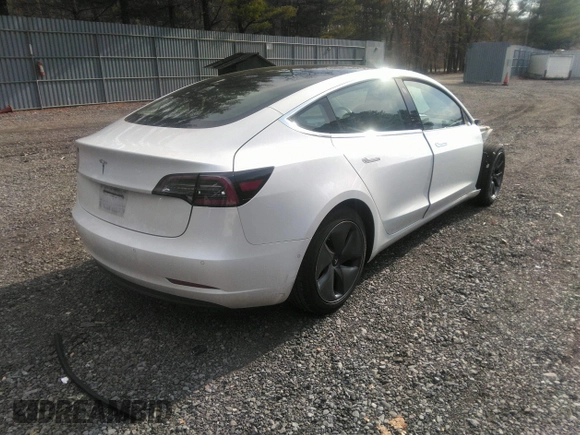 2020 Tesla Model 3 Standard Range Plus with VIN 5YJ3E1EA4LF792830, listed as a IAAI auction lot 41852919 with 76,461 mi miles. Bid and sale history available at carsss.com. Image 4.