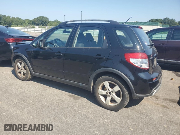 2012 Suzuki SX4 Crossover with VIN JS2YB5A32C6301976, listed as a Copart auction lot 68665194 with 104,489 mi miles and Clean Title. Bid and sale history available at carsss.com. Image 2.