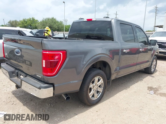 2021 Ford F-150 XL with VIN 1FTEW1CP1MKD21526, listed as a IAAI auction lot 42104907 with 76,317 mi miles and . Bid and sale history available at DreamBid. Image 4.