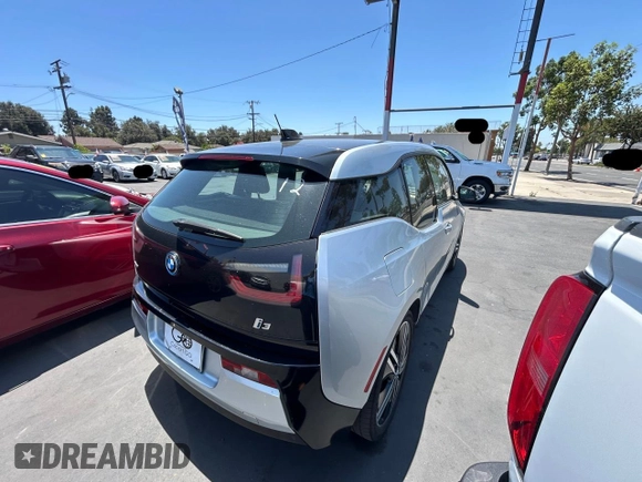 2015 BMW i3 with VIN WBY1Z4C53FV501368, listed as a Copart auction lot 62716005 with 121,929 mi miles and Clean title. Bid and sale history available at DreamBid. Image 4.