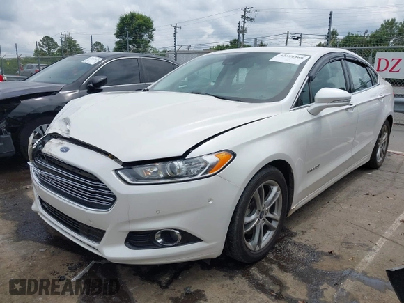 2016 Ford Fusion Titanium Hybrid with VIN 3FA6P0RU3GR190355, listed as a IAAI auction lot 42384309 with 157,172 mi miles and . Bid and sale history available at DreamBid. Image 2.