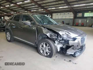 2016 Mazda CX-3 Grand Touring z VIN JM1DKBD77G0116689, wystawiony jako Copart lot #57729405 z przebiegiem 174 965 mil mil oraz Szkoda całkowita • Salvage title. Historia ofert i sprzedaży dostępna na DreamBid. Obrazek 4.