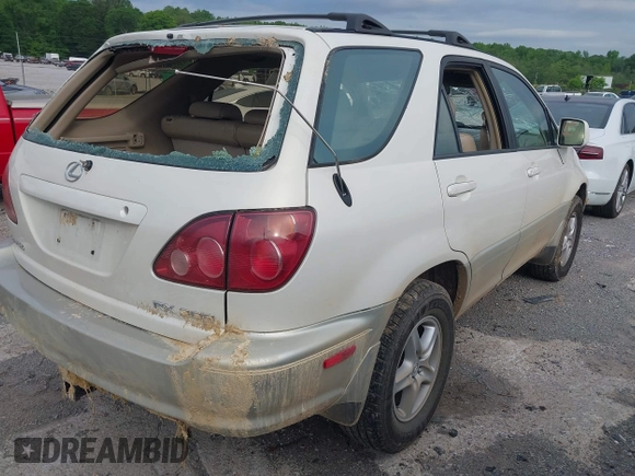 2000 Lexus RX 300 z VIN JT6HF10U2Y0159504, wystawiony jako IAAI lot #42135886 z przebiegiem 180 430 mil mil oraz . Historia ofert i sprzedaży dostępna na DreamBid. Obrazek 4.