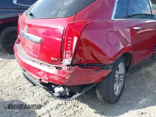 2015 Cadillac SRX z VIN 3GYFNAE3XFS572970, wystawiony jako IAAI lot #40854902 z przebiegiem 124 779 mil mil oraz . Historia ofert i sprzedaży dostępna na DreamBid. Obrazek 16.
