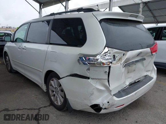 2011 Toyota Sienna XLE AAS with VIN 5TDYK3DC8BS148948, listed as a IAAI auction lot 41806293 with 144,645 mi miles and . Bid and sale history available at DreamBid. Image 3.