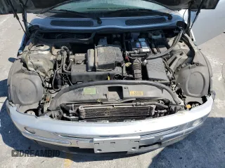 2003 MINI Hardtop with VIN WMWRC33453TE14909, listed as a Copart auction lot 65419725 with 111,960 mi miles and Salvage title. Bid and sale history available at DreamBid. Image 11.