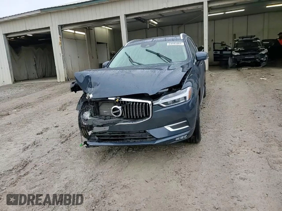 2021 Volvo XC60 Inscription с VIN YV4102DLXM1737403, выставлен на аукционе Copart как лот 84945084 с пробегом 19 900 миль миль и Списание • Salvage title. История ставок и продаж доступна на DreamBid. Изображение 14.
