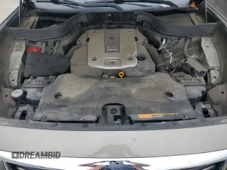 2014 Infiniti QX70 with VIN JN8CS1MW7EM412867, listed as a Copart auction lot 60054195 with 148,064 mi miles and Salvage title. Bid and sale history available at DreamBid. Image 12.