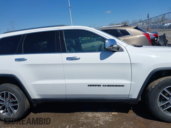 2018 Jeep Grand Cherokee Limited with VIN 1C4RJFBG5JC195143, listed as a IAAI auction lot 41993171 with 118,036 mi miles and . Bid and sale history available at DreamBid. Image 13.