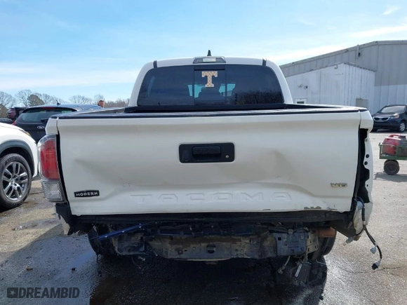2020 Toyota Tacoma 4WD SR5 with VIN 3TMCZ5AN3LM309635, listed as a IAAI auction lot 41598363 with 99,080 mi miles. Bid and sale history available at carsss.com. Image 16.