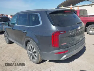 2020 Kia Telluride S with VIN 5XYP64HCXLG008043, listed as a IAAI auction lot 41808448 with 89,658 mi miles and . Bid and sale history available at carsss.com. Image 3.
