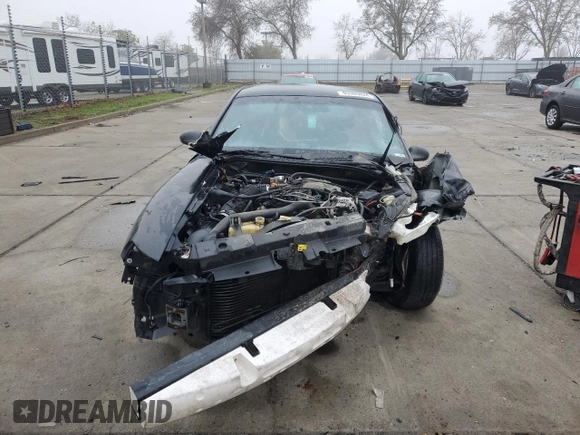 1997 Ford Mustang with VIN 1FALP4049VF136060, listed as a Copart auction lot 85389824 with 0 mi miles and Salvage Title. Bid and sale history available at carsss.com. Image 5.