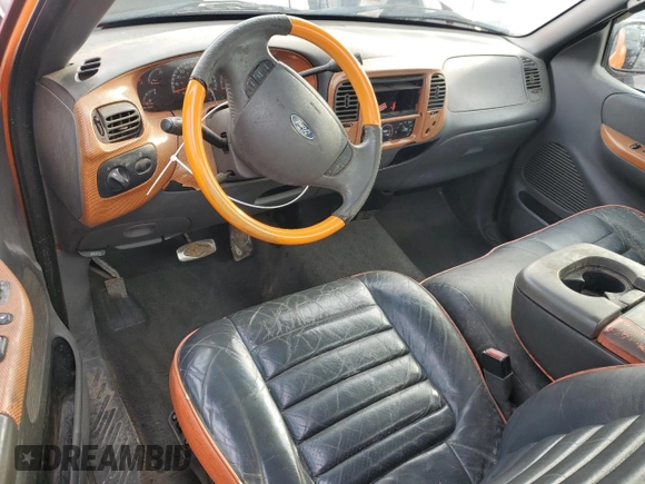 2003 Ford F-150 XL with VIN 1FTRF07L33KA88704, listed as a Copart auction lot 88526885 with Not provided miles and Salvage title. Bid and sale history available at DreamBid. Image 8.