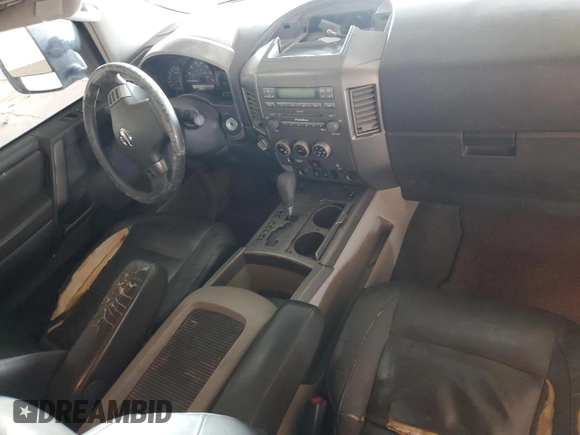 2004 Nissan Titan SE with VIN 1N6AA06B84N577326, listed as a Copart auction lot 59724355 with 179,549 mi miles and Salvage title. Bid and sale history available at DreamBid. Image 8.