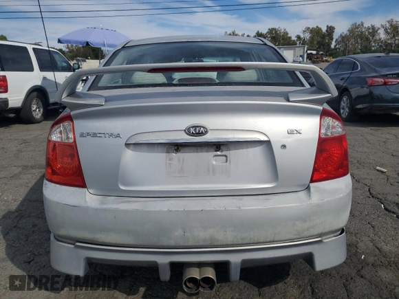 2006 Kia Spectra EX with VIN KNAFE122765228554, listed as a Copart auction lot 78458004 with 154,085 mi miles and Clean Title. Bid and sale history available at carsss.com. Image 6.