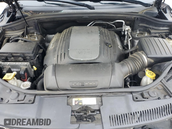 2014 Dodge Durango Citadel with VIN 1C4SDJET9EC435191, listed as a Copart auction lot 58572665 with 168,478 mi miles and Salvage title. Bid and sale history available at DreamBid. Image 12.