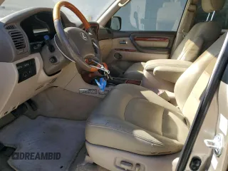2002 Lexus LX 470 z VIN JTJHT00W523513337, wystawiony jako Copart lot #47001735 z przebiegiem 261 108 mil mil oraz Szkody całkowita. Historia ofert i sprzedaży dostępna na DreamBid. Obrazek 7.