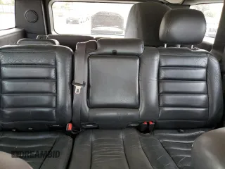 2005 Hummer H2 SUV with VIN 5GRGN23UX5H115383, listed as a Copart auction lot 71682984 with 157,405 mi miles and Salvage Title. Bid and sale history available at carsss.com. Image 10.