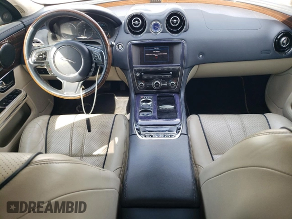 2013 Jaguar XJ Portfolio with VIN SAJWJ2GD3D8V47879, listed as a Copart auction lot 54558195 with 99,500 mi miles and Clean Title. Bid and sale history available at DreamBid. Image 8.