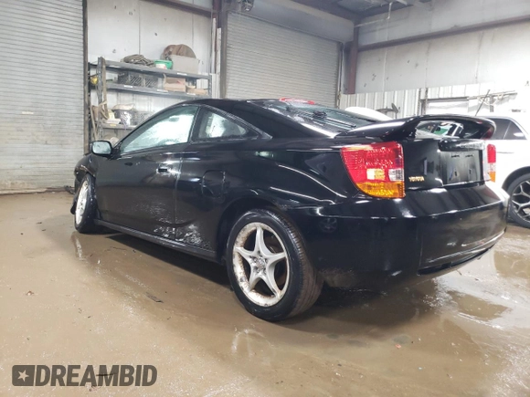 2000 Toyota Celica GTS with VIN JTDDY32T0Y0023275, listed as a Copart auction lot 50836735 with 154,144 mi miles and Salvage Title. Bid and sale history available at DreamBid. Image 2.