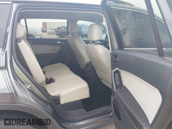 2018 Volkswagen Tiguan SEL with VIN 3VV3B7AX3JM000585, listed as a IAAI auction lot 41905836 with 99,114 mi miles and . Bid and sale history available at DreamBid. Image 8.