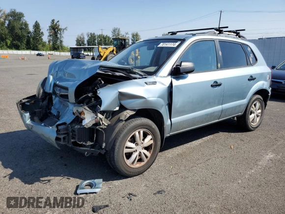 2009 Hyundai Tucson GLS with VIN KM8JM12B29U953176, listed as a Copart auction lot 70141174 with 77,132 mi miles and Salvage Title. Bid and sale history available at carsss.com. Image 1.