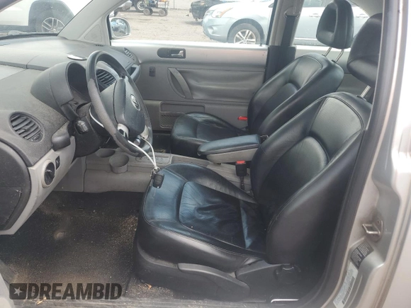 2001 Volkswagen Beetle GLX with VIN 3VWDD21C21M406898, listed as a Copart auction lot 55597675 with 104,597 mi miles and Salvage Title. Bid and sale history available at DreamBid. Image 7.
