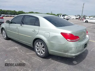 2007 Toyota Avalon XL with VIN 4T1BK36B27U219456, listed as a IAAI auction lot 41747807 with 169,599 mi miles. Bid and sale history available at carsss.com. Image 3.