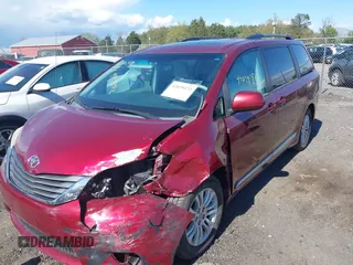 2014 Toyota Sienna XLE with VIN 5TDYK3DC8ES457940, listed as a IAAI auction lot 42039472 with 99,769 mi miles and . Bid and sale history available at DreamBid. Image 6.