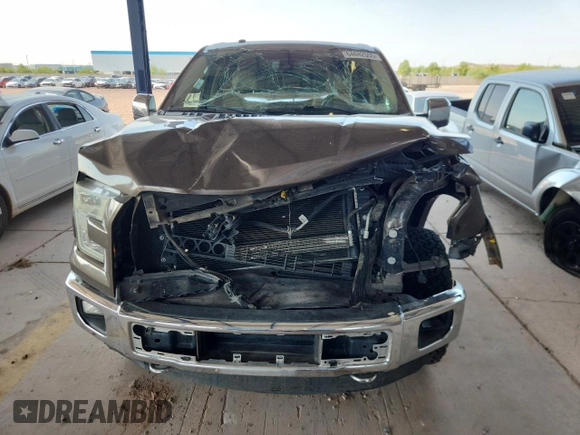 2015 Ford F-150 XLT with VIN 1FTEW1EG0FKD89591, listed as a Copart auction lot 64042555 with 98,638 mi miles and Salvage title. Bid and sale history available at DreamBid. Image 5.