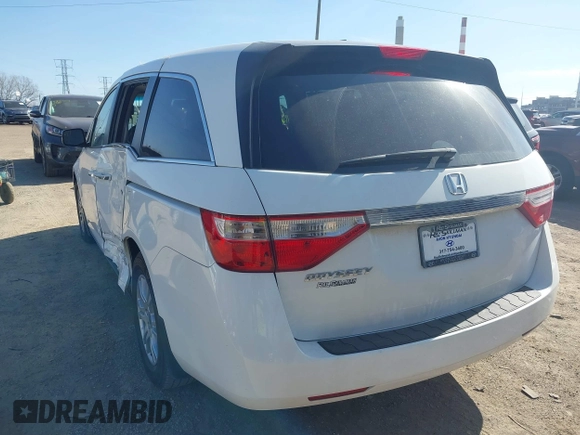 2011 Honda Odyssey EX-L with VIN 5FNRL5H69BB062666, listed as a IAAI auction lot 41829319 with 152,105 mi miles and . Bid and sale history available at carsss.com. Image 3.