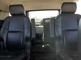 2014 Chevrolet Tahoe LTZ with VIN 1GNSKCE03ER201981, listed as a Copart auction lot 56421125 with 173,710 mi miles and Salvage title. Bid and sale history available at DreamBid. Image 10.