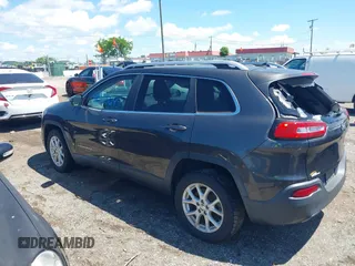 2014 Jeep Cherokee Latitude with VIN 1C4PJLCS0EW297415, listed as a IAAI auction lot 42198645 with 160,268 mi miles. Bid and sale history available at carsss.com. Image 14.