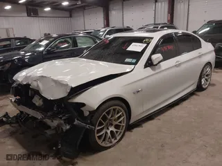 2016 BMW 5 Series 550i xDrive with VIN WBAKP9C50GD980460, listed as a IAAI auction lot 41847849 with 101,000 mi miles. Bid and sale history available at carsss.com. Image 17.