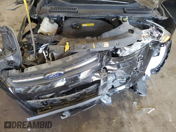 2016 Ford Escape SE z VIN 1FMCU9GXXGUA99014, wystawiony jako Copart lot #56494855 z przebiegiem 37 883 mil mil oraz Szkoda całkowita • Salvage title. Historia ofert i sprzedaży dostępna na DreamBid. Obrazek 11.