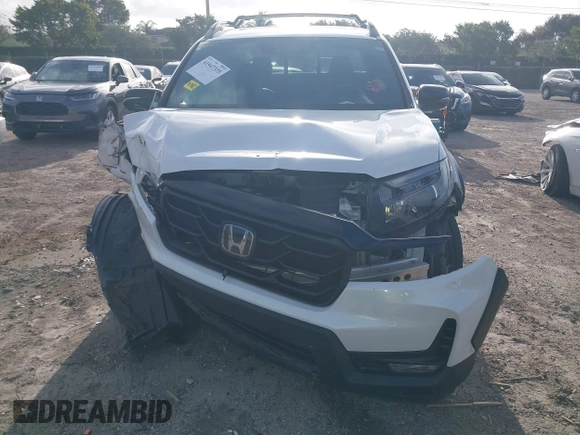 2023 Honda Ridgeline Black Edition with VIN 5FPYK3F81PB006534, listed as a IAAI auction lot 41947335 with 38,127 mi miles and . Bid and sale history available at DreamBid. Image 12.