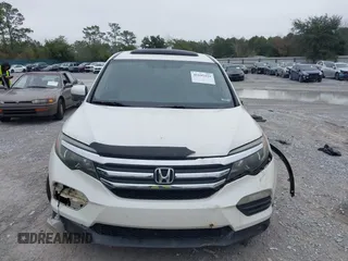 2017 Honda Pilot EX-L with VIN 5FNYF5H54HB009568, listed as a IAAI auction lot 41195225 with 112,763 mi miles. Bid and sale history available at carsss.com. Image 12.