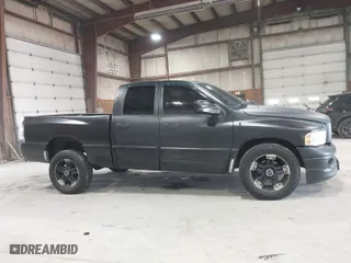 2007 Dodge Ram 1500 SLT with VIN 1D7HU18267J601104, listed as a IAAI auction lot 41933034 with 150,255 mi miles. Bid and sale history available at carsss.com. Image 13.