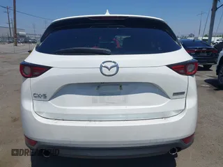 2020 Mazda CX-5 Grand Touring with VIN JM3KFADM9L0821930, listed as a IAAI auction lot 42549986 with 29,929 mi miles and . Bid and sale history available at DreamBid. Image 16.