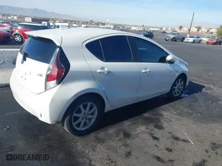 2015 Toyota Prius c One with VIN JTDKDTB35F1114505, listed as a IAAI auction lot 41159078 with 126,335 mi miles. Bid and sale history available at carsss.com. Image 4.