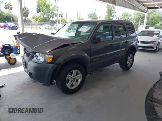 2005 Ford Escape Hybrid with VIN 1FMCU95HX5KD54412, listed as a IAAI auction lot 42115468 with 151,922 mi miles and . Bid and sale history available at DreamBid. Image 17.