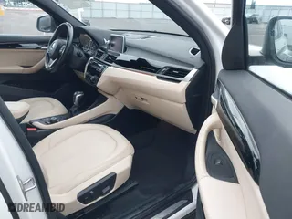 2018 BMW X1 sDrive28i with VIN WBXHU7C32J5H44246, listed as a IAAI auction lot 41477050 with 69,858 mi miles. Bid and sale history available at carsss.com. Image 5.