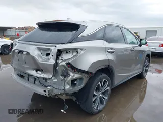 2020 Lexus RX with VIN 2T2HZMAA9LC178535, listed as a IAAI auction lot 41920764 with 119,377 mi miles. Bid and sale history available at carsss.com. Image 4.
